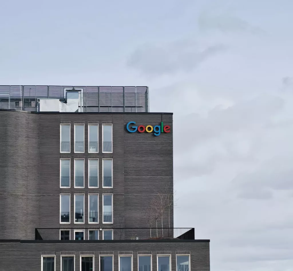 A Building With Google's Logo in Day Light.