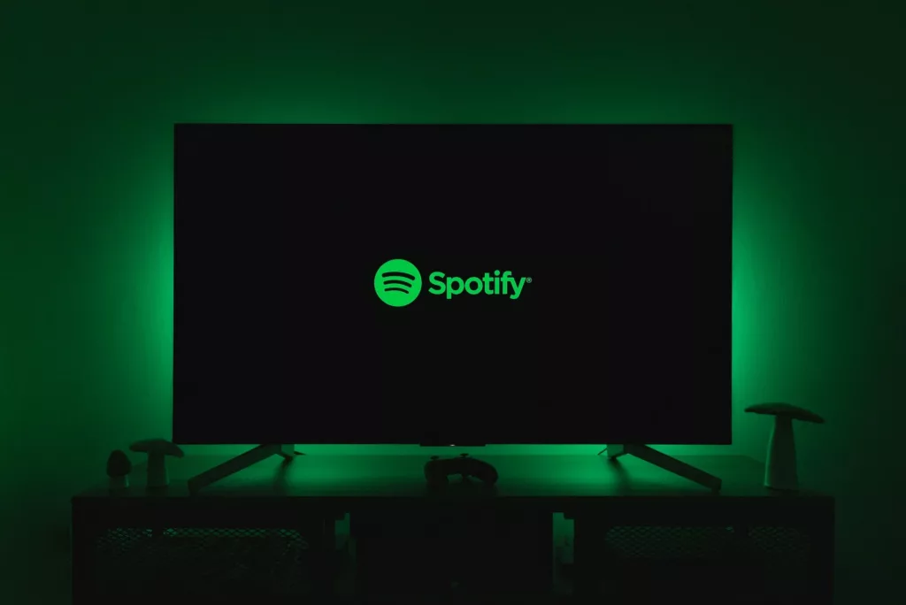 a Spotify logo on a TV