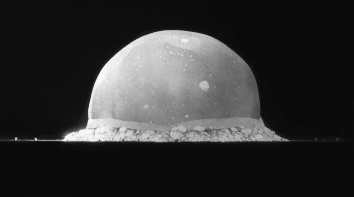 Stunning 1945 Trinity Nuclear Test Images Finally Restored Photo of the earliest instant of the first atomic explosion is seen as a grayish-white semi-sphere against a black backg