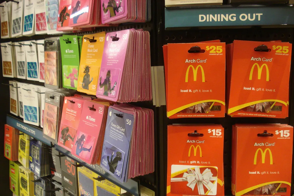 Prime Day Gift Card Deals 2026: Top Ways to Save Real Money Image may contain Book and Shelf