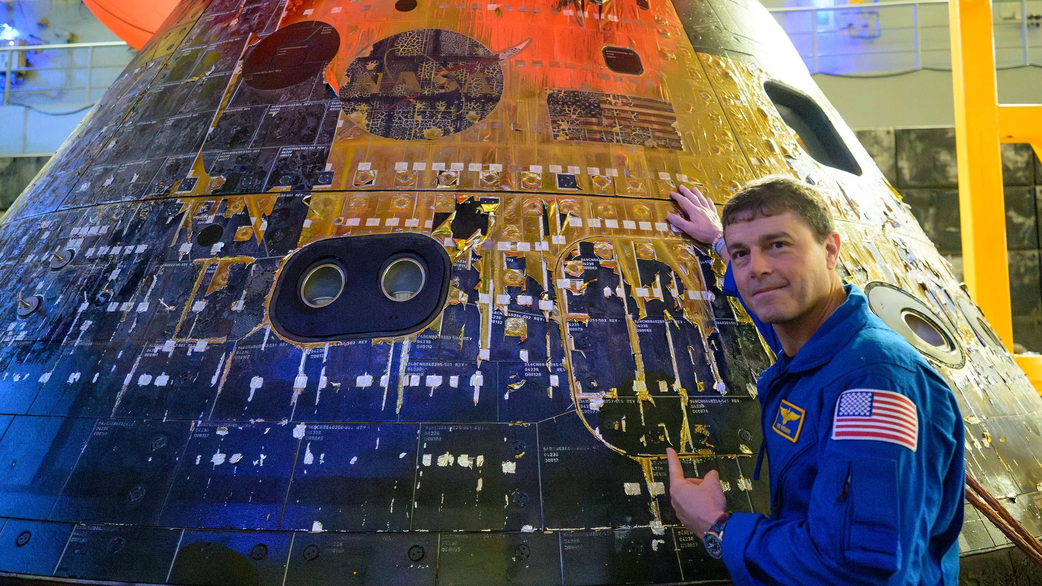 Moon Missions and Meteor Storms: The Critical Risk NASA Is Planning Fo moon missions meteor — Artemis 2 commander Reid Wiseman is photographed in a blue NASA jumpsuit looking back at the came