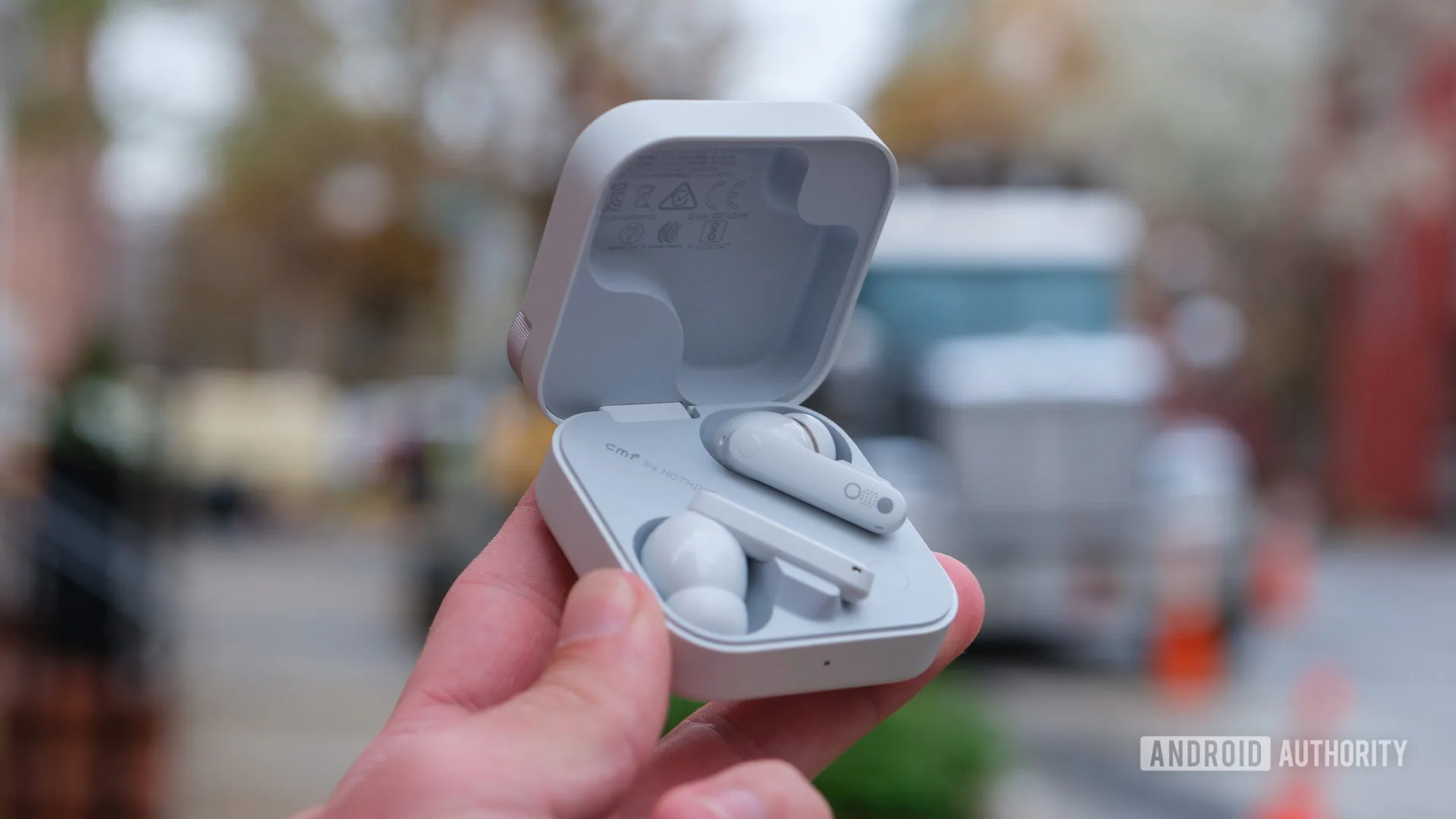 CMF Buds Pro 2 Hit $37 Best Price Ahead of Prime Day 2026 Nothing CMF Buds Pro 2 in front of construction