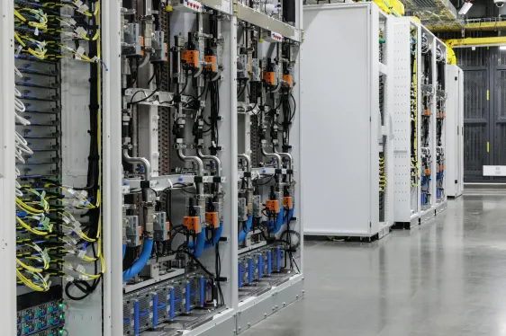 Musk's SpaceX Eyes Mesh Optical in Latest Data Center Power Play racks of GPUs (graphics processing units) with a closed-loop liquid cooling system are seen inside an operational Micros