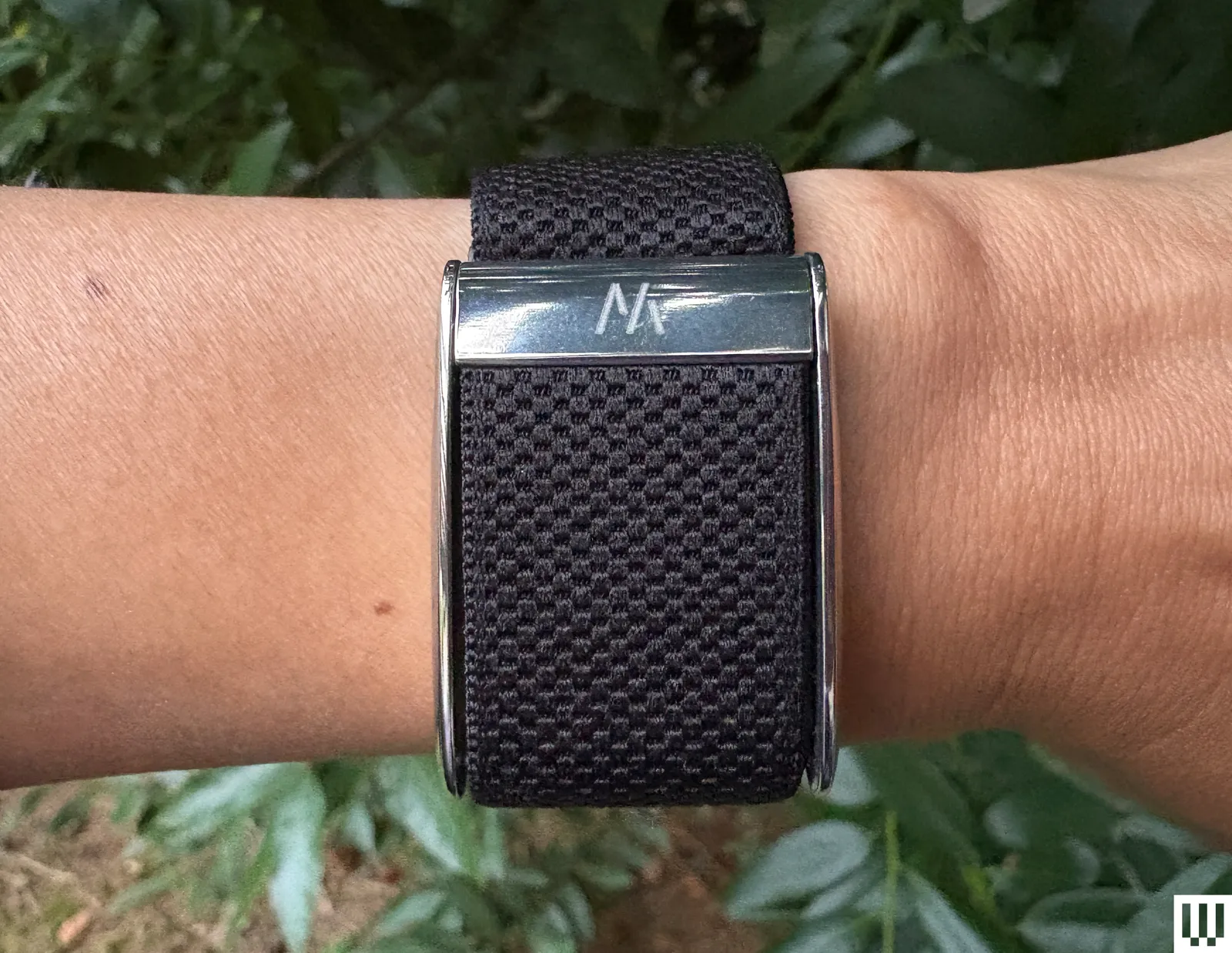 Best Fitness Trackers 2026: Top 3 Picks from Garmin, Oura & Fitbit Image may contain Wristwatch Arm Body Part Person Hand Wrist Accessories Bracelet and Jewelry