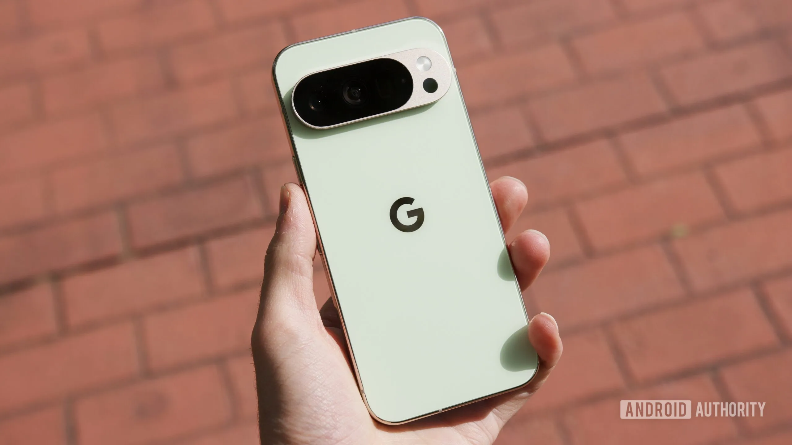 Best Google Pixel Prime Day Deals 2026: Top 5 Picks Google Pixel Prime Day deals — Someone holding the Google Pixel 10 Pro, with a brick sidewalk behind it.