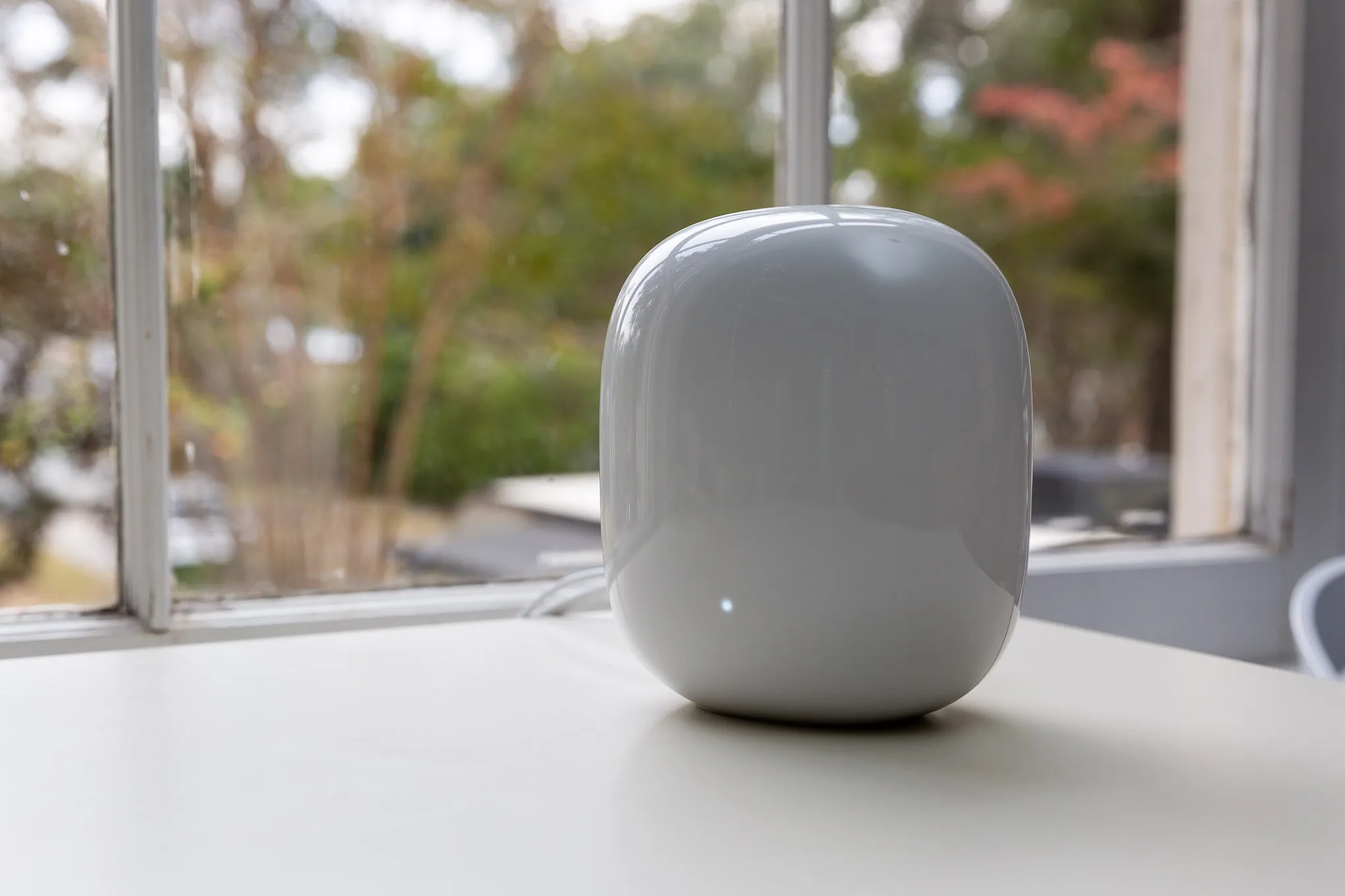 Best Smart Home Deals This Prime Day: Top Picks for 2025 best smart home deals — White Google Nest Wifi Pro router on a white table in front of a window.