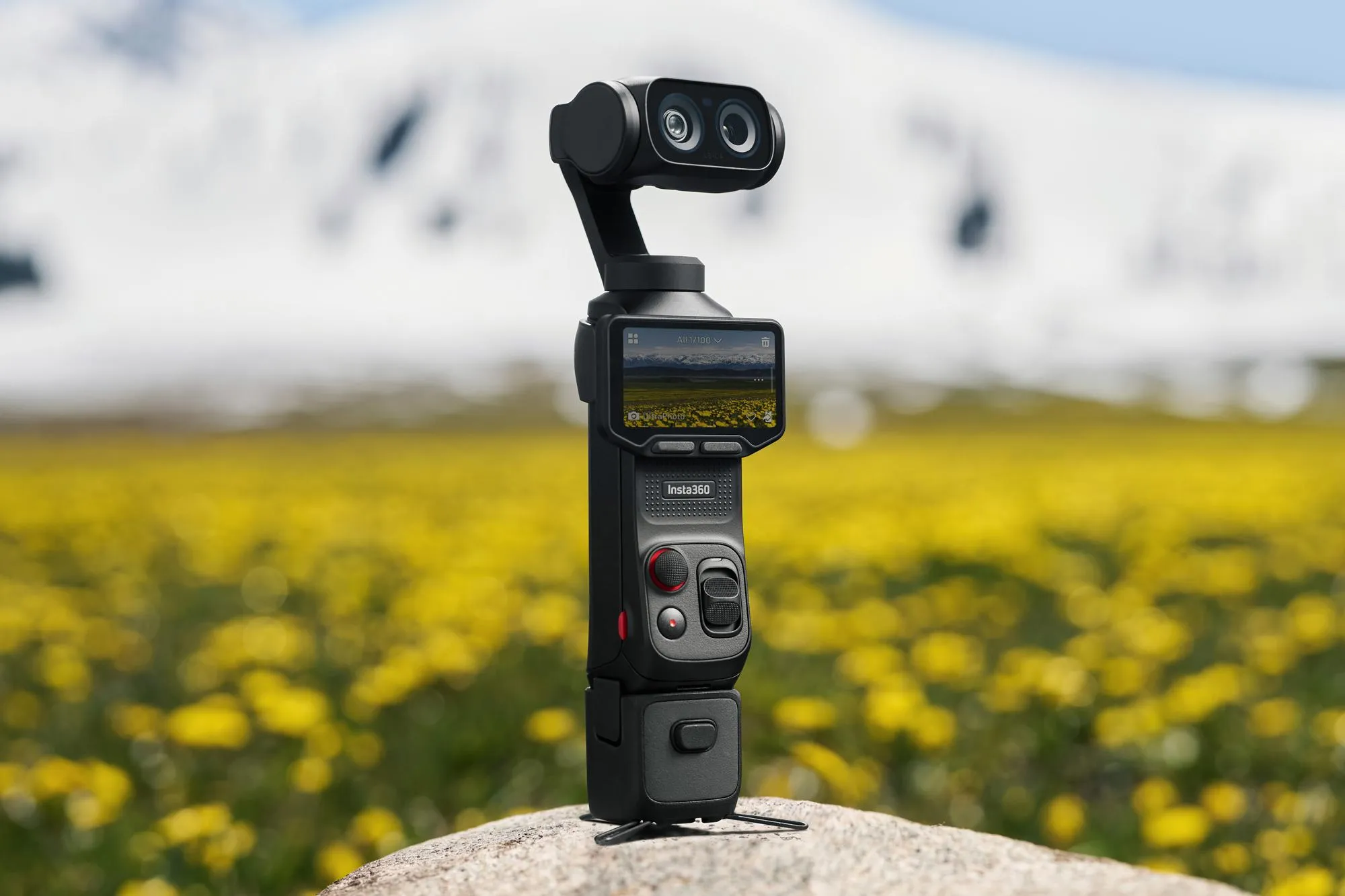 Insta360 Luna Ultra Review: New 8K Stabilized Camera at $770 The Insta360 Luna Ultra camera perched on a rock with a field of flowers and mountains in the background.