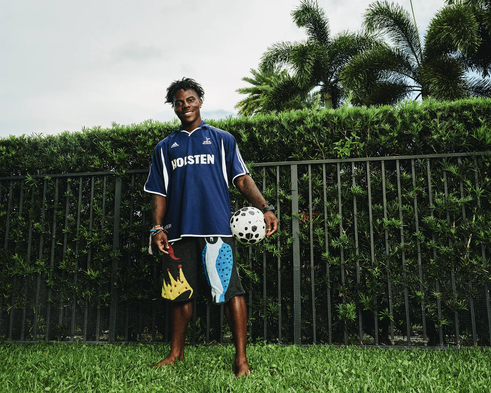 IShowSpeed: How Gen Z's Biggest Streamer Became the New ESPN Image may contain Clothing Sleeve Adult Person Ball Football Soccer Soccer Ball Sport Curly Hair and Hair
