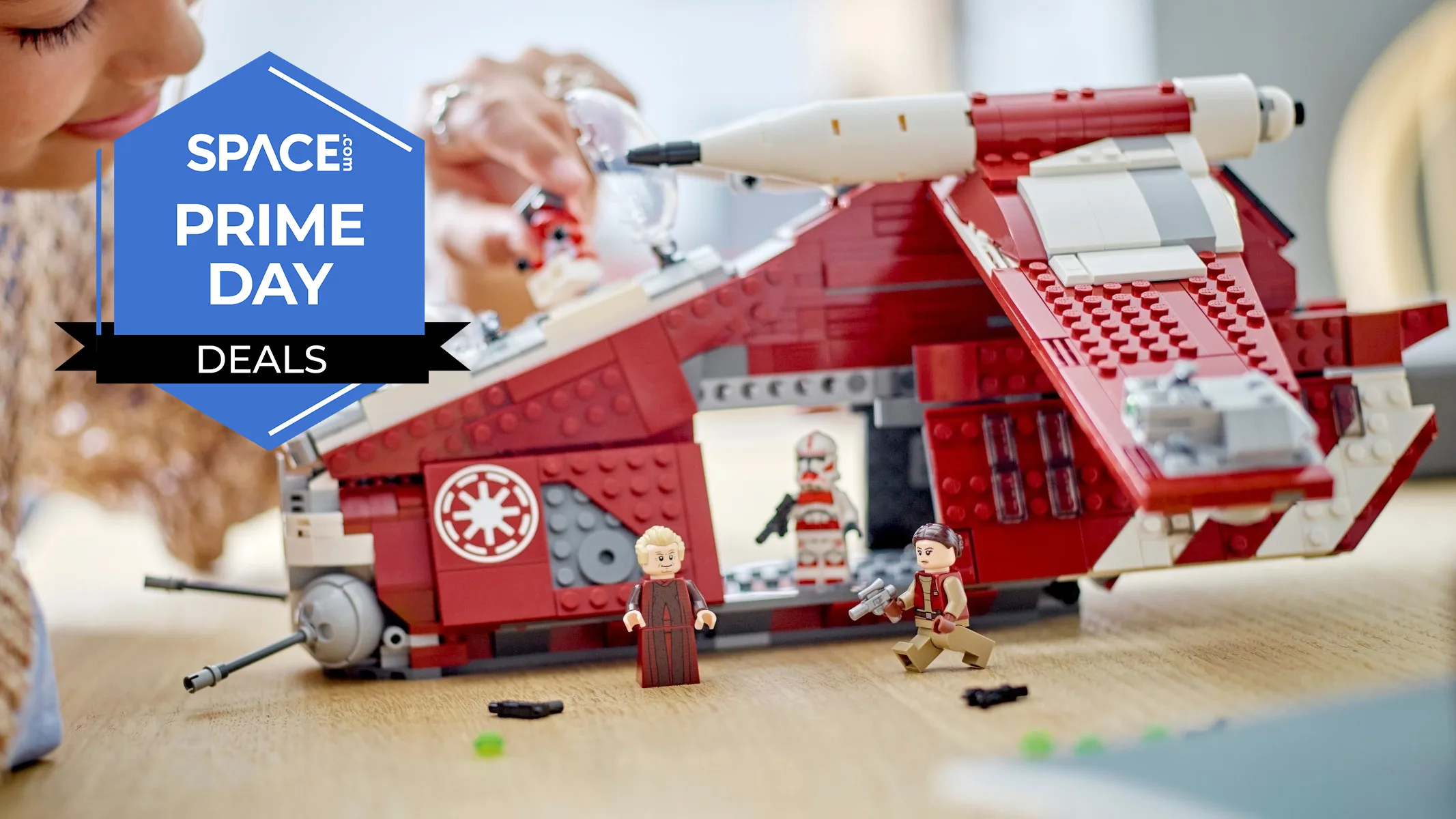 Lego Star Wars Coruscant Guard Gunship: Best Price Before It's Gone Lego Star Wars Gunship — A girl playing with a LEGO Star Wars: The Clone Wars Coruscant Guard Gunship on a table.