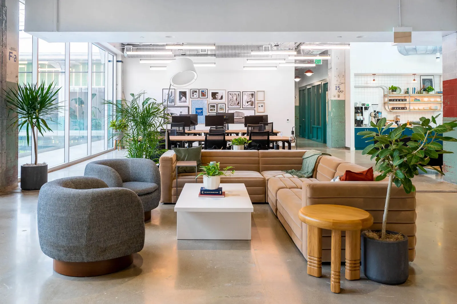 Houston Business Travel Guide: Best Hotels, Workspaces & Food in 2026 Image may contain Home Decor Indoors Architecture Building Furniture Living Room Room Foyer Couch and Table