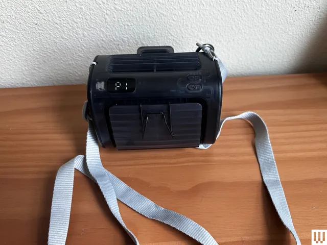 Best Handheld Fans of 2026: Top Picks Tested and Ranked Image may contain Accessories Strap and Photography