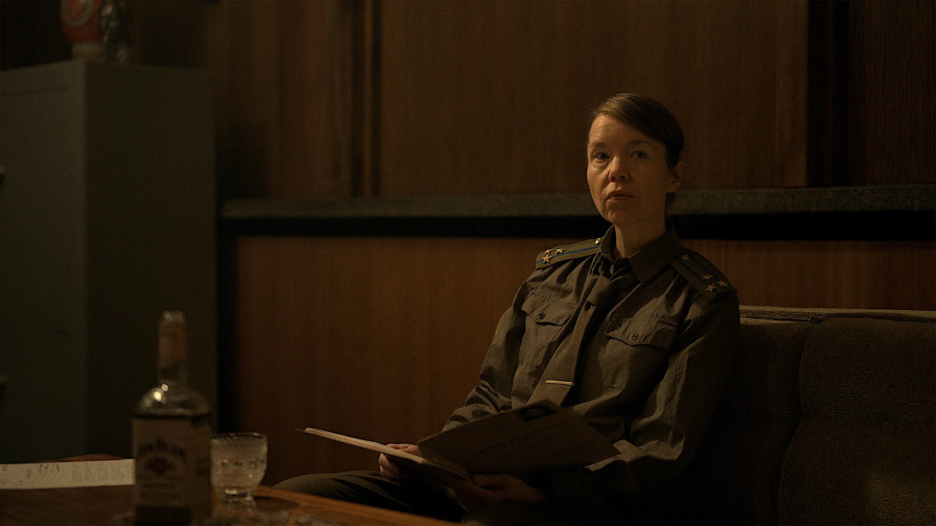 Star City on Apple TV+: The Best New Sci-Fi Thriller Explained a woman in a military uniform in a dark office