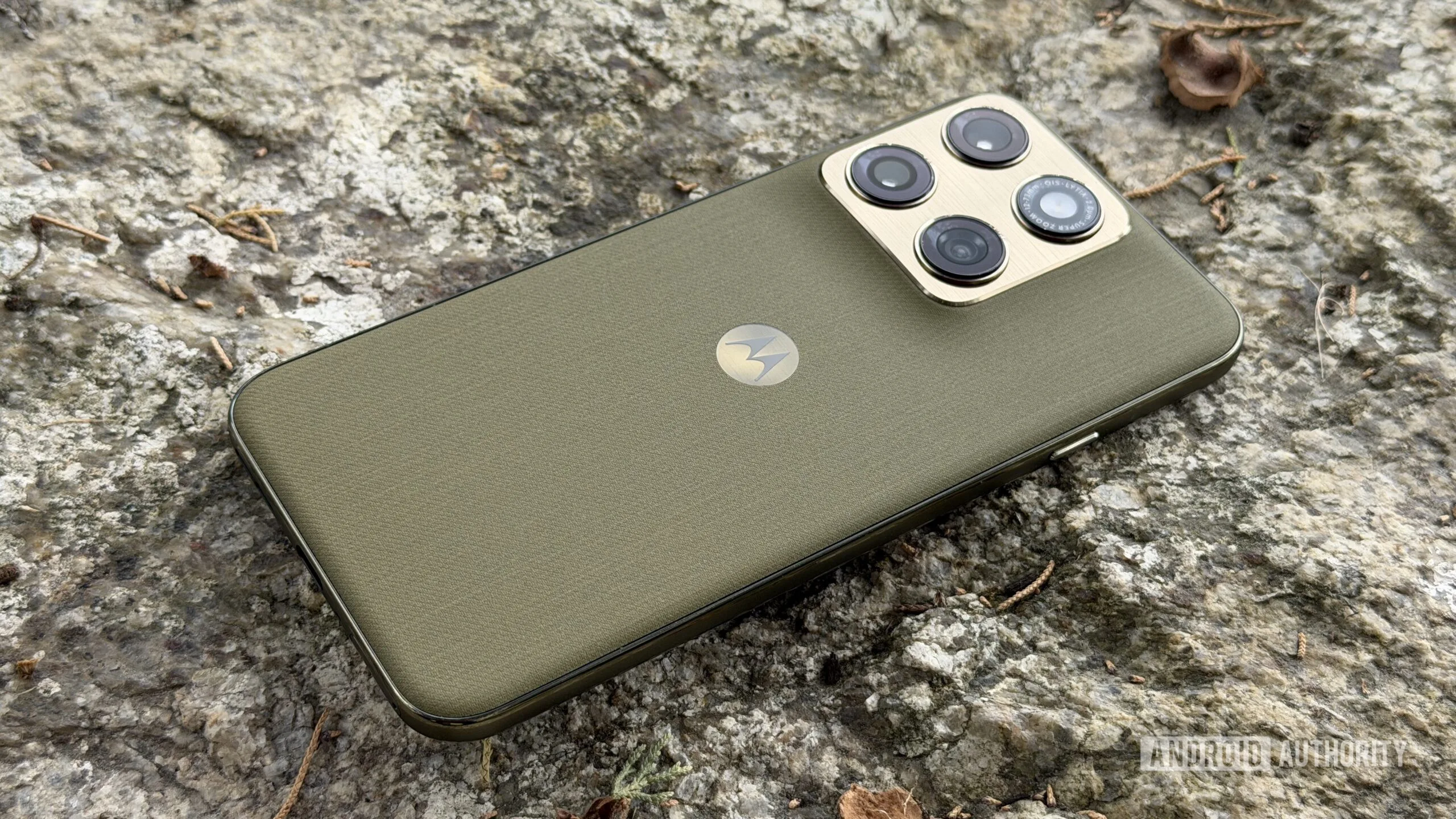 Motorola Edge 2026 vs Pixel 10a: The Best Mid-Range Phone Right Now Motorola Edge 2026 against rock