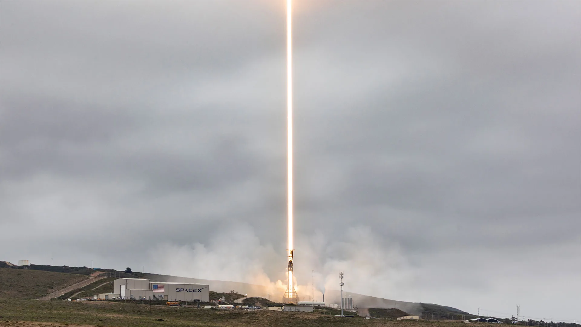 SpaceX Falcon 9 Launches 24 New Starlink Satellites, Booster Hits 33 F Starlink satellite launch — a timelapse exposure of a daytime rocket launch results in a bright beam of light climbing i