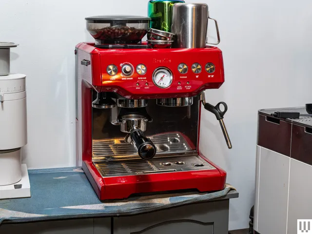 Best Espresso Machine Deals at Prime Day 2026: Breville and Ninja Image may contain: Cup, Appliance, Device, Electrical Device, and Mixer