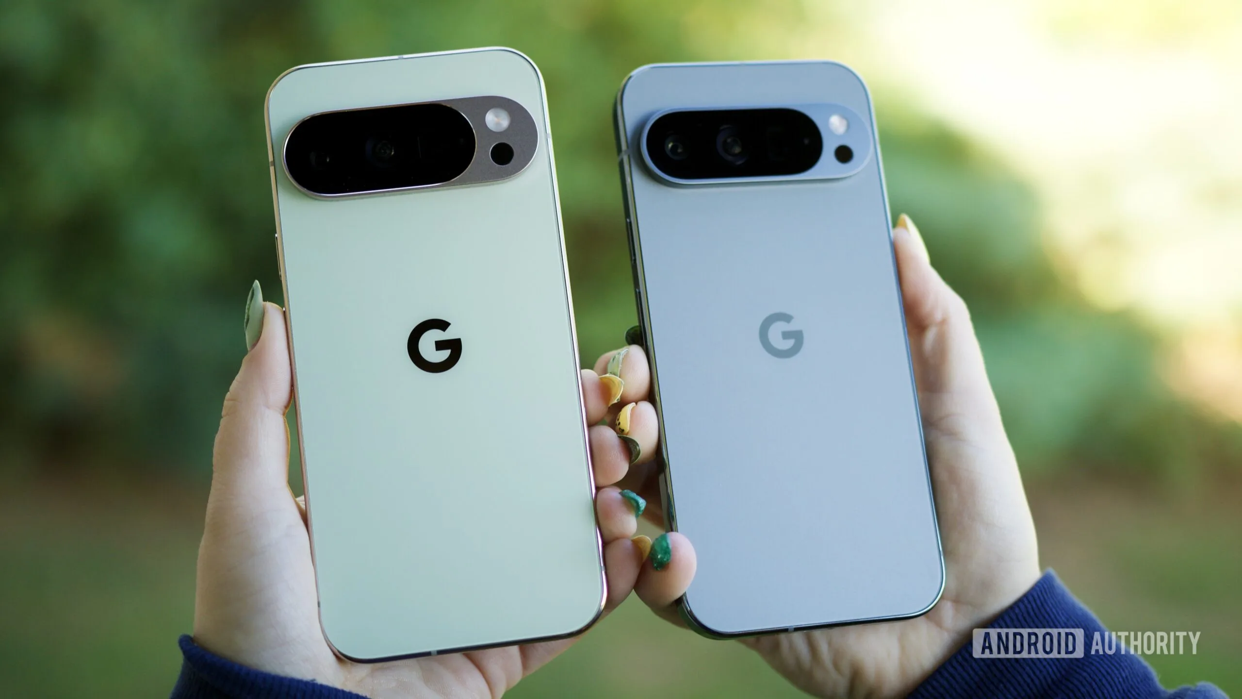 Android 17 June Pixel Drop: Every Compatible Pixel Phone Listed Android 17 June Pixel Drop — Someone holding the Pixel 10 Pro and Pixel 9 Pro, showing the backs of the phones.