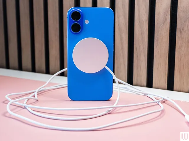 Best MagSafe Wireless Chargers in 2026: Top 15 Picks Tested MagSafe wireless chargers — Apple MagSafe Charger a blue mobile phone case with silver disc in the center with a cord c