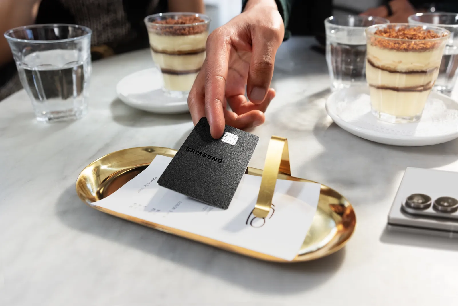 Galaxy Card: Samsung’s New Bid for Wallet Loyalty Image may contain Text Food Food Presentation Credit Card and Paper