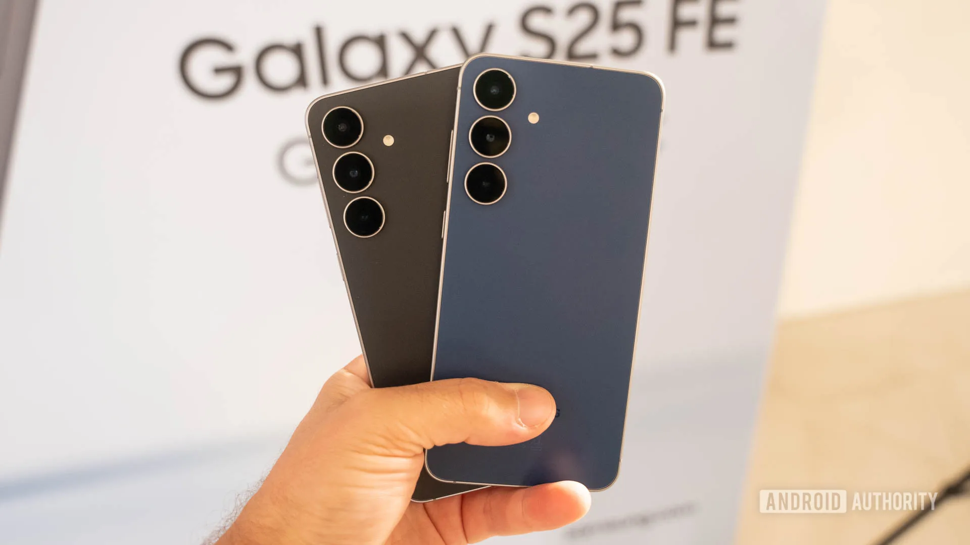 Samsung’s Galaxy S26 FE Is Officially on the Way Galaxy S26 FE 2026 — Samsung Galaxy S25 FE in Jetblack and Navy held together in man's hand