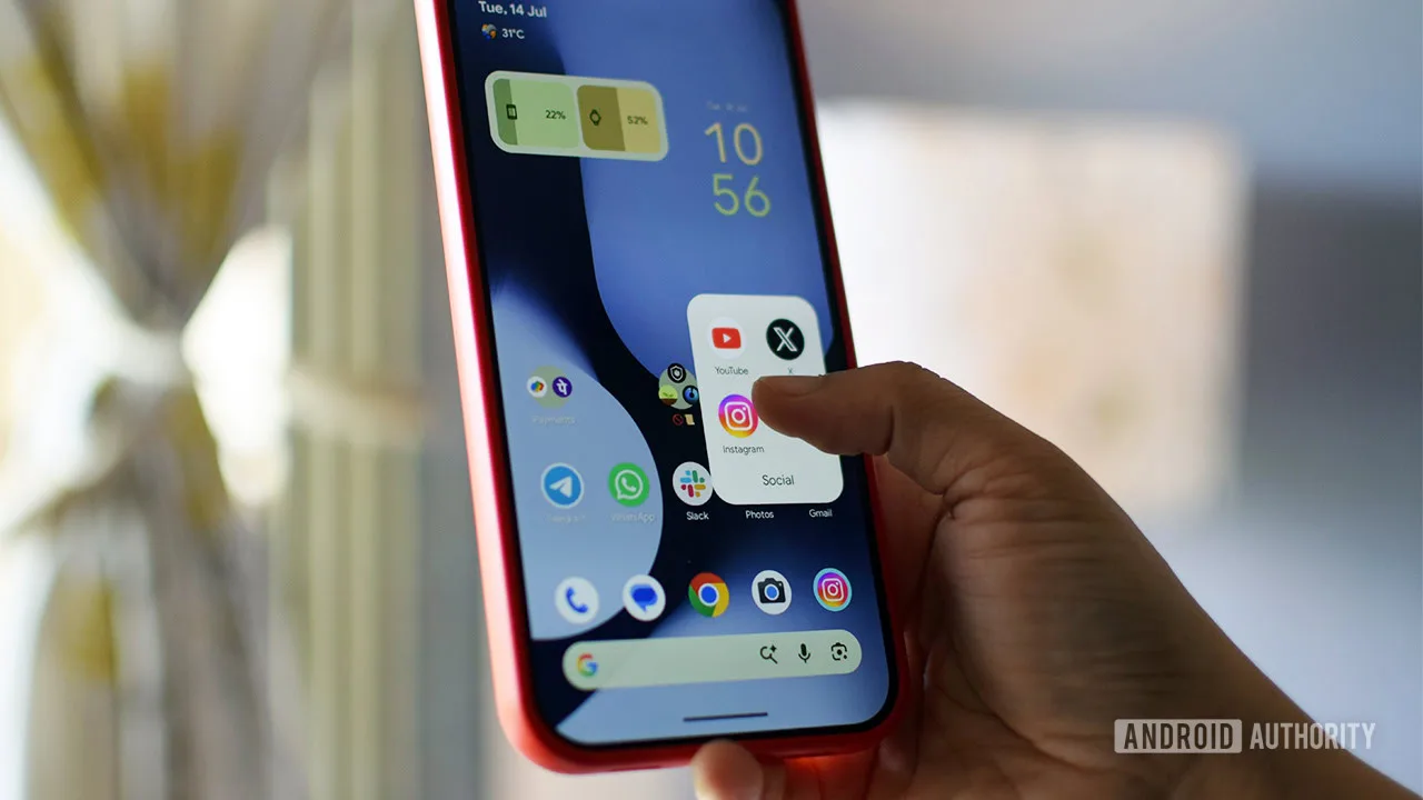 Android Pause Point Has 3 Effective Alternatives Today Android Pause Point — Photo of someone opening an app folder on an Android phone.