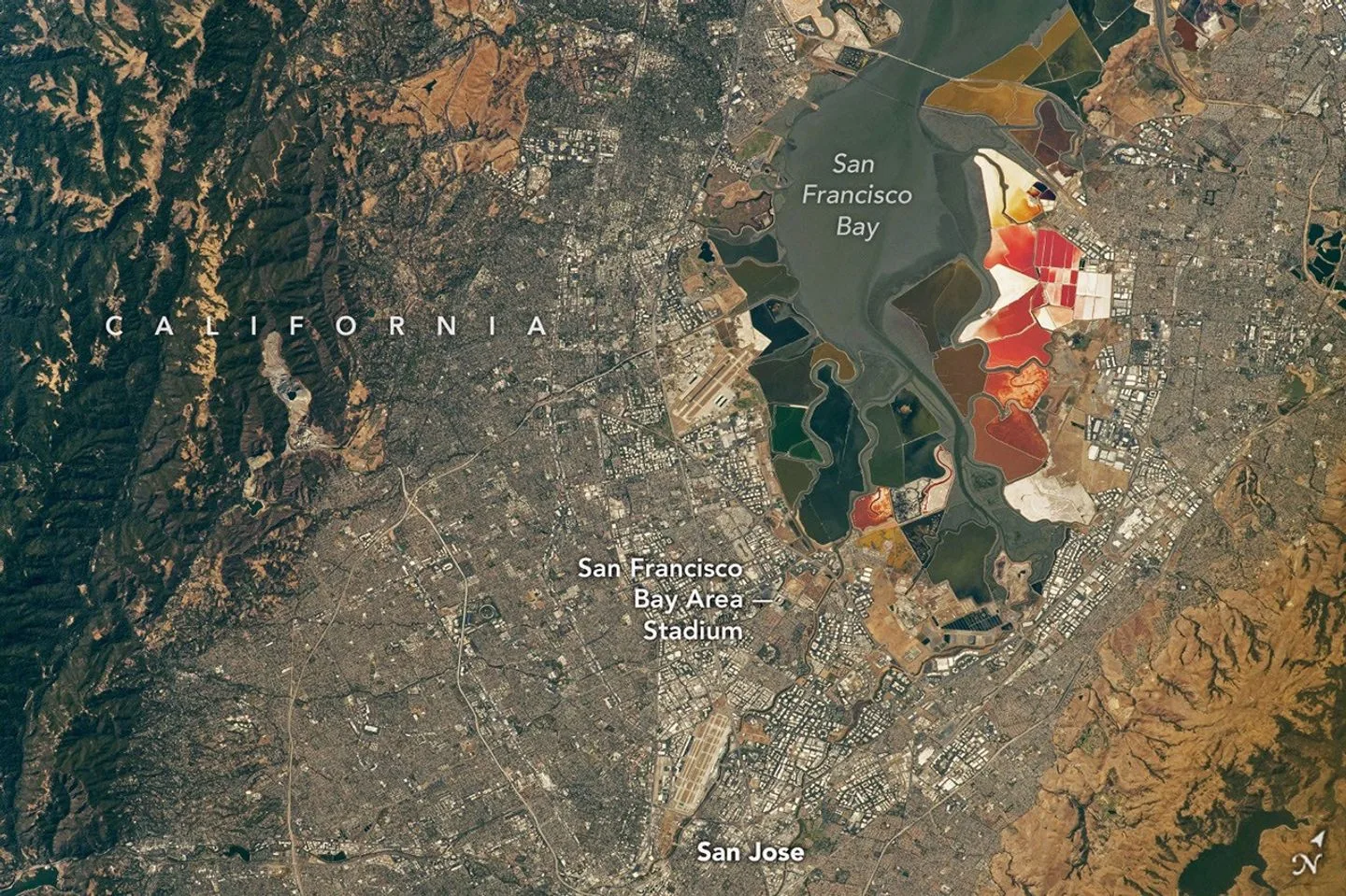 NASA's ISS Photos Reveal 2026 World Cup Stadiums From 250 Miles Up ISS World Cup photos — An aerial view of the San Francisco Bay Area Stadium, middle-left, is surrounded by urban infrast