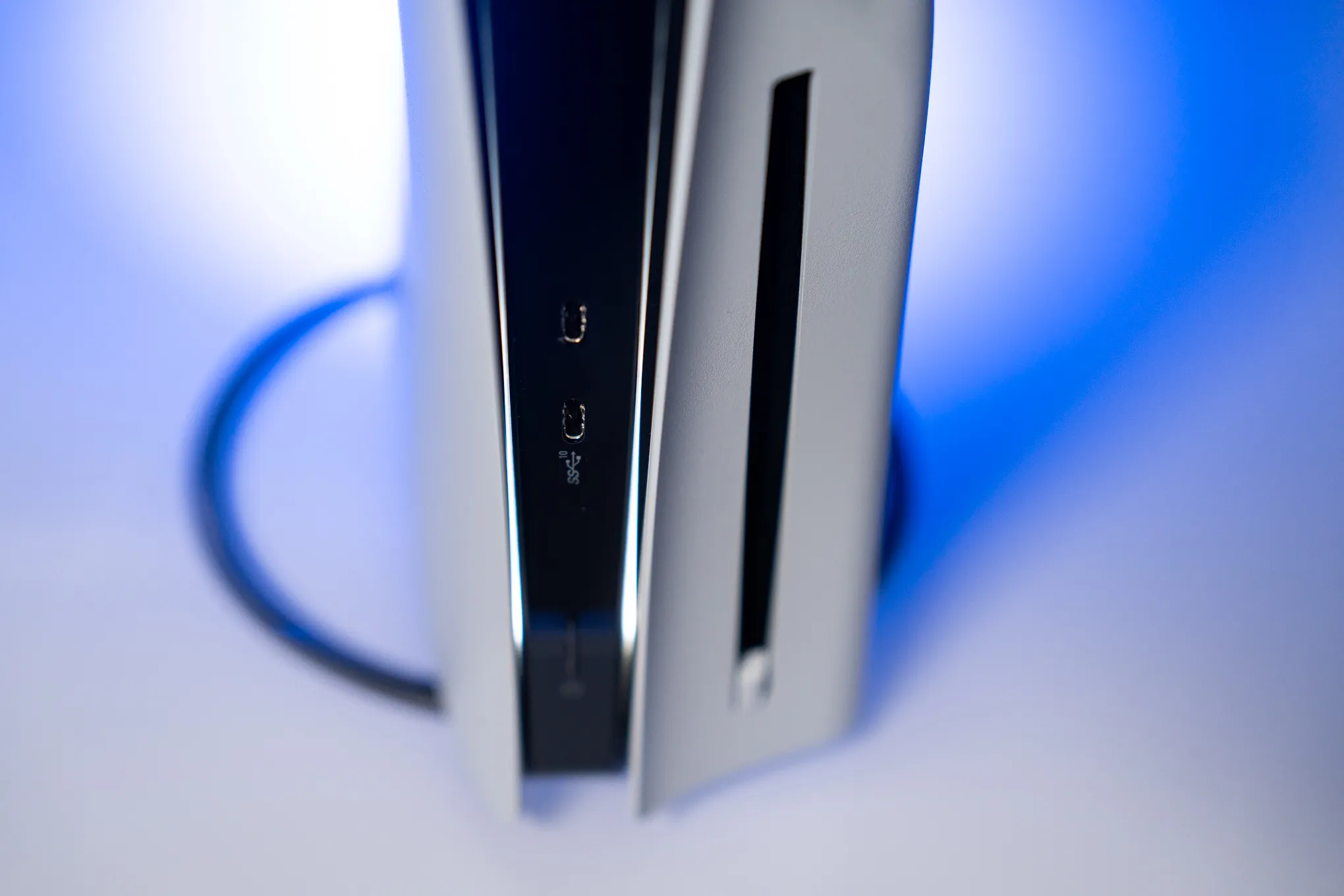 PlayStation Disc Factory Gets New Life Making Microlenses A photo of the disc drive on the PS5 “slim.”