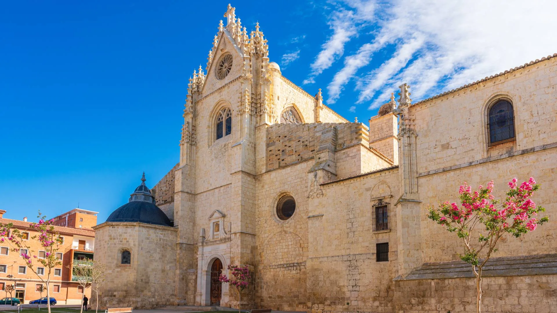 Spain Solar Eclipse 2026: Top 10 Cities for Best Views Gothic-style stone church with ornate facade, large rose window, and arched entrance, set against a bright blue sky. Pin