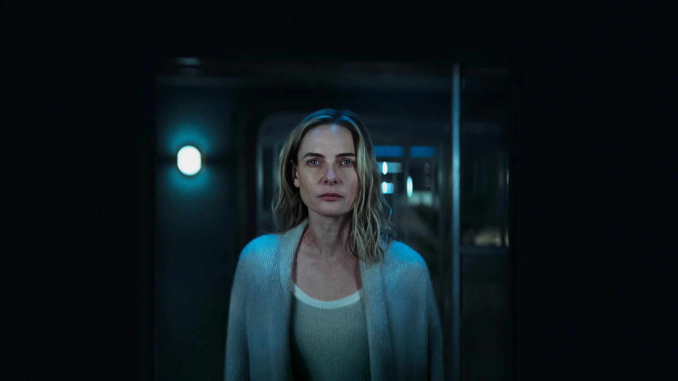 Silo Season 3: Complete Guide to the New Apple TV+ Thriller Silo season 3 — a woman in a sweater staring into a mirror