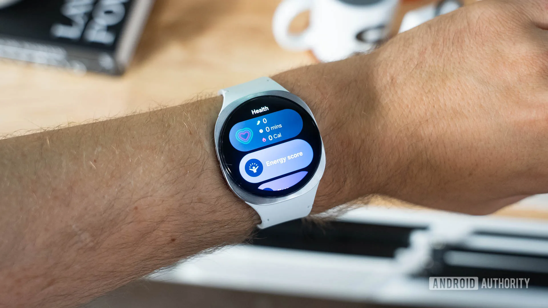 Galaxy Watch 9 Needs a Major Battery-Life Fix Galaxy Watch 9 2026 — Samsung Galaxy Watch 8 on wrist showing widgets