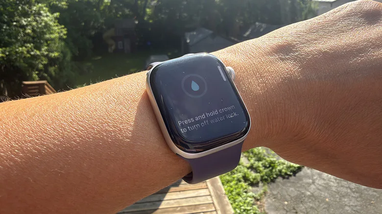 Apple Watch Water Lock Explained: What It Actually Does Apple Watch Water Lock — A wrist outside with an Apple Watch showing the water lock feature on.