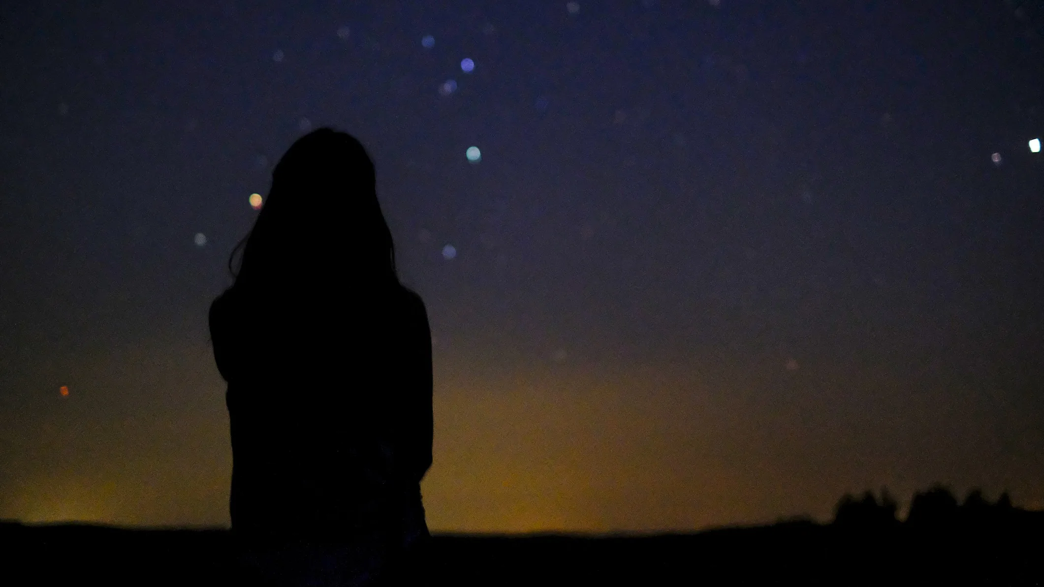 Venus Sky Shows in July 2025: Your Complete Viewing Guide Venus sky shows — a woman looks at a sky full of stars