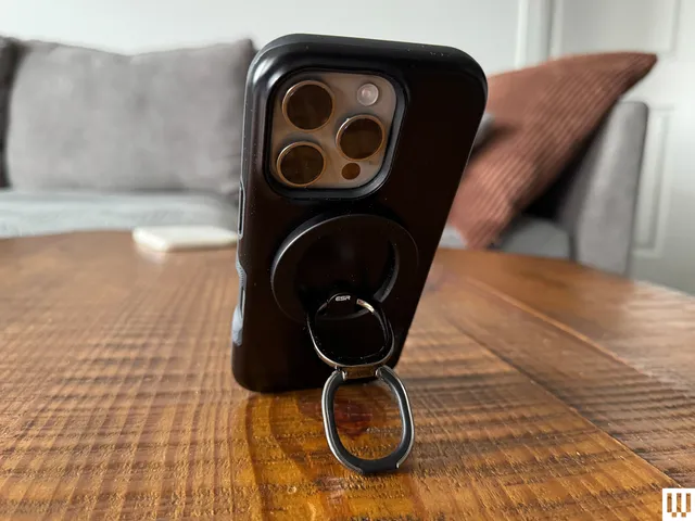 MagSafe Phone Grips: The Essential Accessory Guide Best MagSafe Grips ESR brand using its stand on a wood table