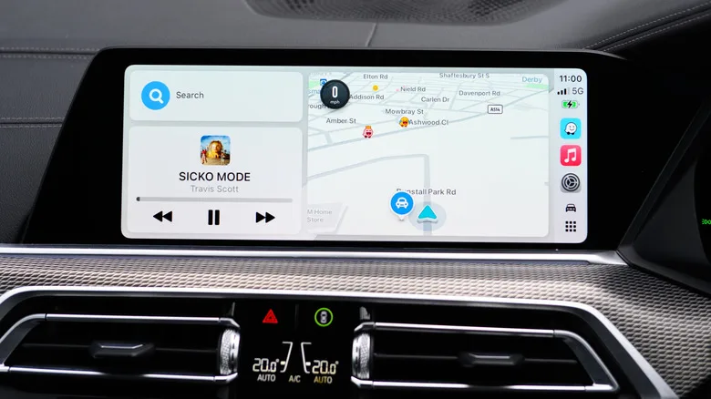 Apple CarPlay Audio: 5 Expert Fixes for Better Sound Apple CarPlay audio — Apple CarPlay in use inside a car, the left side showing Apple Music playback, with the right side