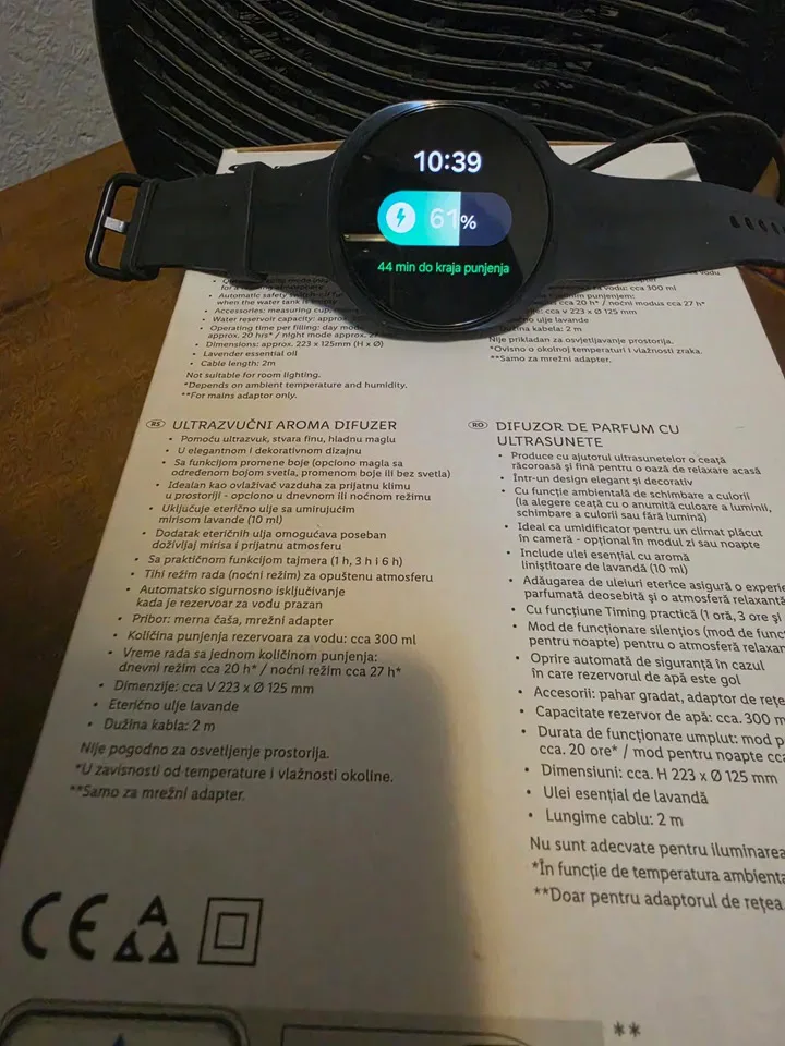 Galaxy Watch 9 charging has a critical heat problem Samsung Galaxy Watch 9 display showing 61 percent battery level at 10:39 AM during an active fan cooling thermal test.