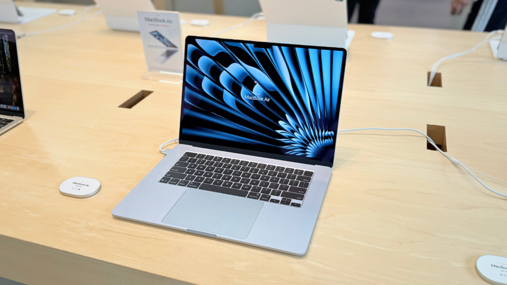 MacBook Deals: The Best Discounts in a Pricier Apple Era MacBook deals 2026 — sky blue M4 macbook air - display apple store - arin