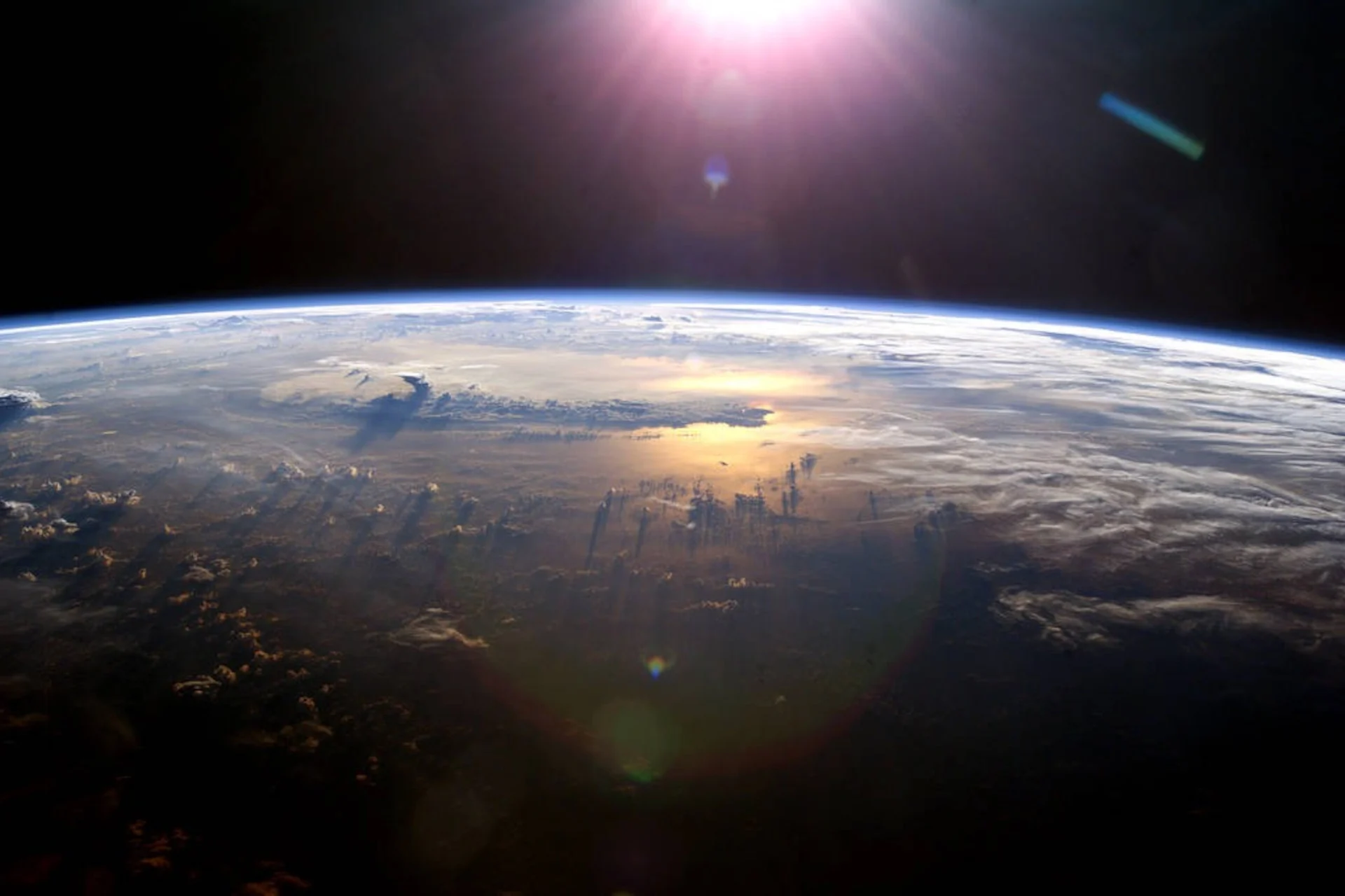Project Suncatcher Sends Google TPUs Toward an Orbital Test Project Suncatcher — The Earth and Sun.