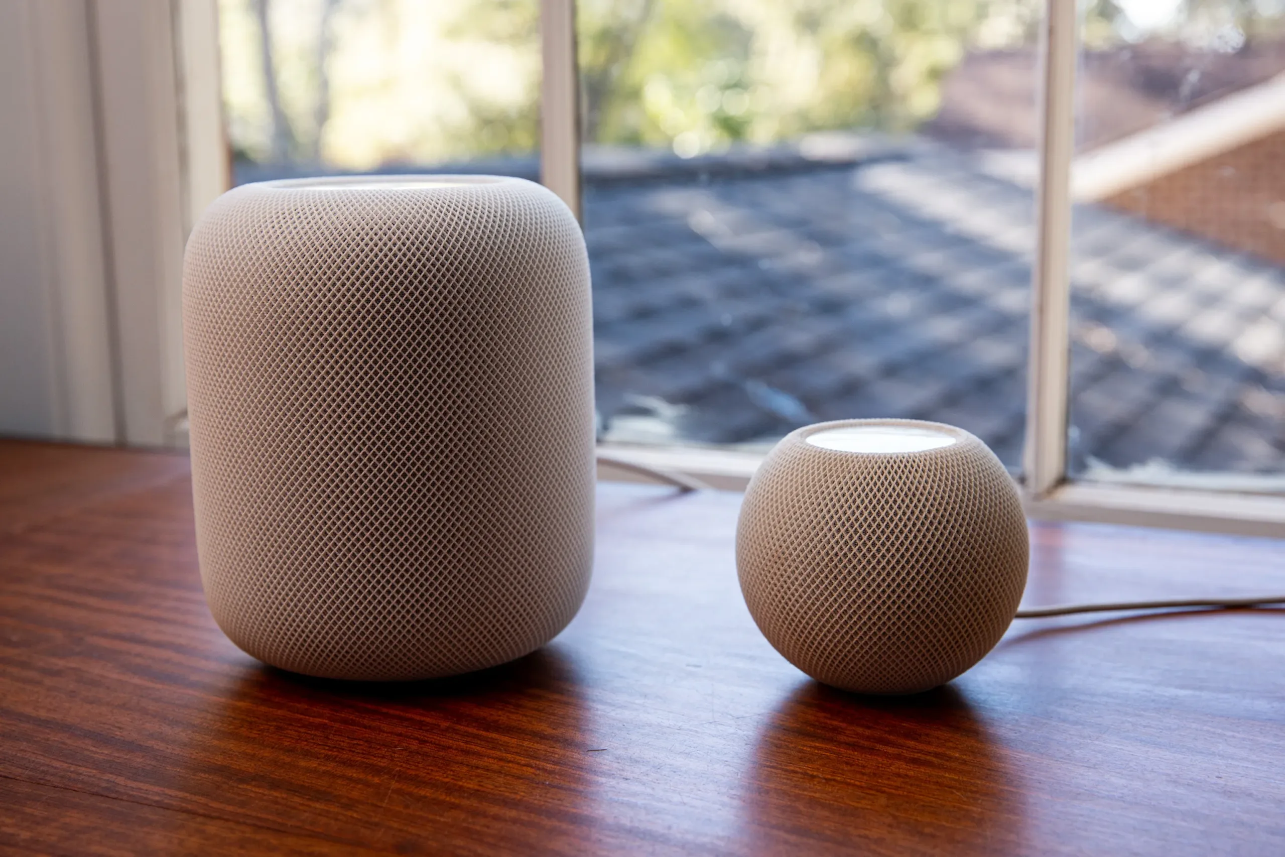 Apple Smart Home Has a Critical Software Problem to Solve A photo showing Apple’s HomePod (second-gen) and HomePod Mini.
